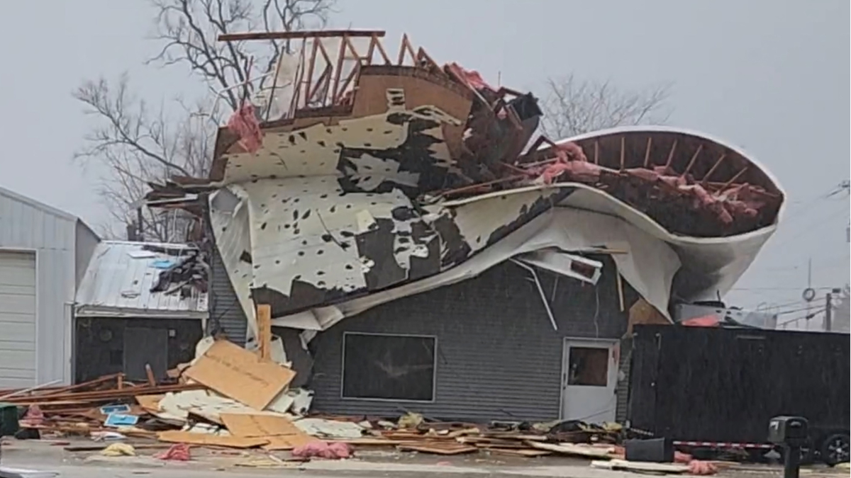 A view of damage to a building caused by a tornado, in Colona, Illinois, U.S. April 4, 2023 in this screen grab obtained from a social media video.
