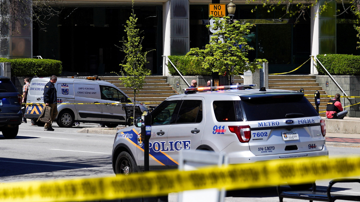 Police respond to a mass shooting at a bank in downtown Louisville, Kentucky on Monday, April 10.
