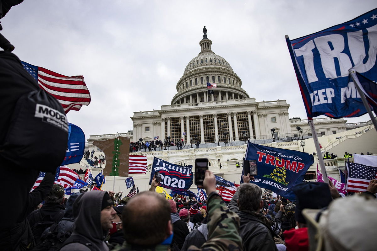 Pro-Trump supporters storm the U.S. Capitol on January 6, 2021 in Washington, DC. Multiple law enforcement officers and two US Capitol staff members stood before a federal judge in Washington, DC, on May 24 and recounted their terror.
