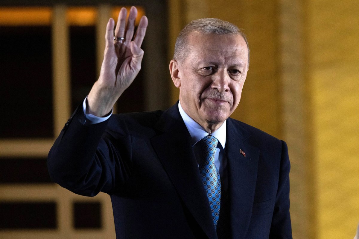 <i>Chris McGrath/Getty Images</i><br/>President Recep Tayyip Erdogan gestures to supporters at the presidential palace after winning the presidential runoff in Ankara