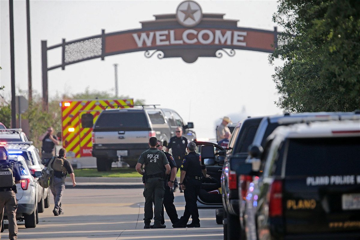 <i>Stewart  F. House/Getty Images</i><br/>Emergency personnel work at the scene of the  shooting at Allen Premium Outlets on May 6 in Allen