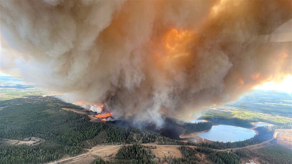 <i>Alberta Wildfire/Handout/Reuters</i><br/>A smoke column rises from wildfire near Lodgepole