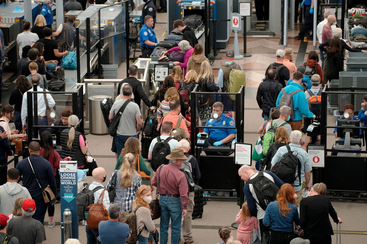 AAA says this Memorial Day weekend could be the busiest at airports since 2005. Pictured are travelers at Denver International Airport in 2022, in Denver.
