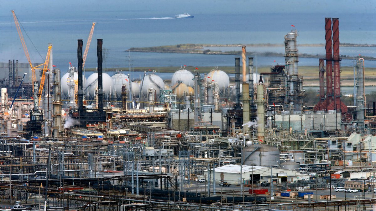 <i>Michael Macor/San Francisco Chronicle/AP</i><br/>Hundreds of hazardous industrial sites that dot the California coastline -- including oil and gas refineries and sewage-treatment plants -- are at risk of severe flooding from rising sea level if the climate crisis worsens. Pictured is a Chevron refinery in Richmond