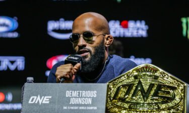 One Championship flyweight world champion Demetrious Johnson speaks at a pre-fight press conference at 1stBank Center in Denver