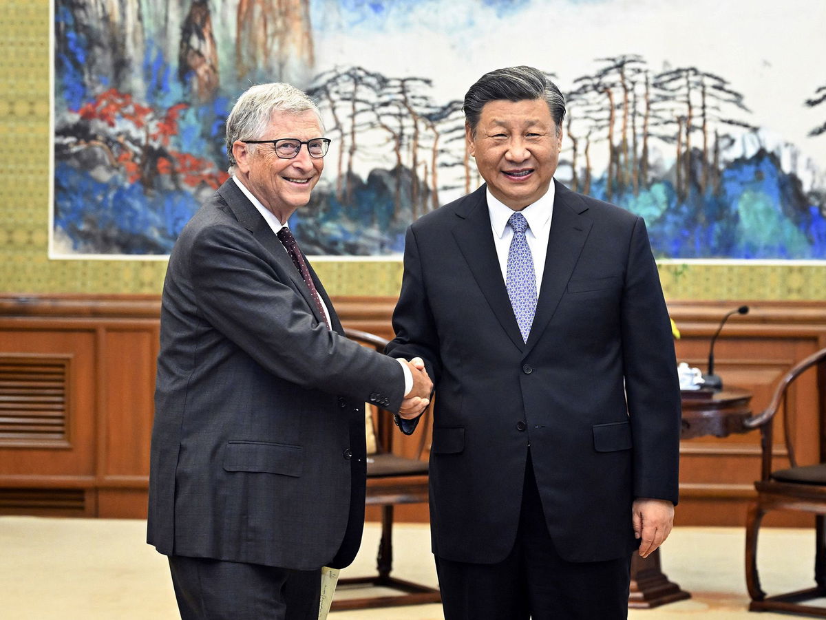 Bill Gates, left, meets with Chinese President Xi Jinping in Beijing, Friday, June 16.
