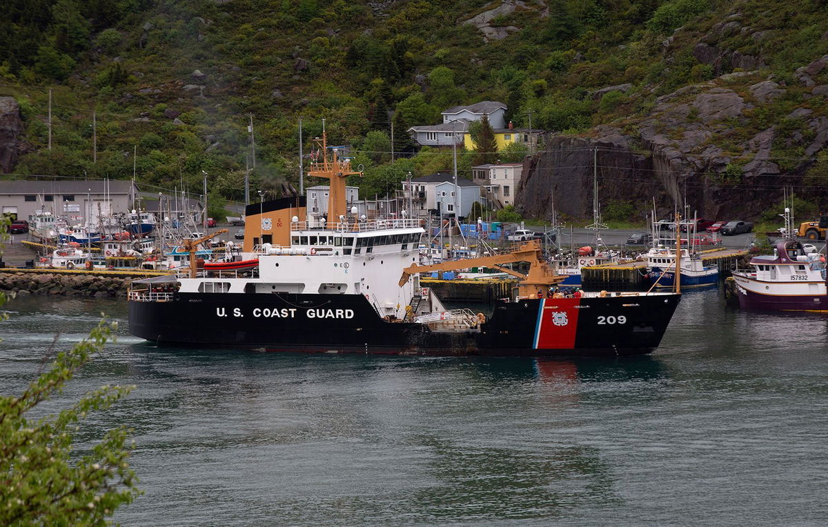 <i>Paul Daly/AP</i><br/>A U.S. Coast Guard ship arrives in the harbor of St. John's