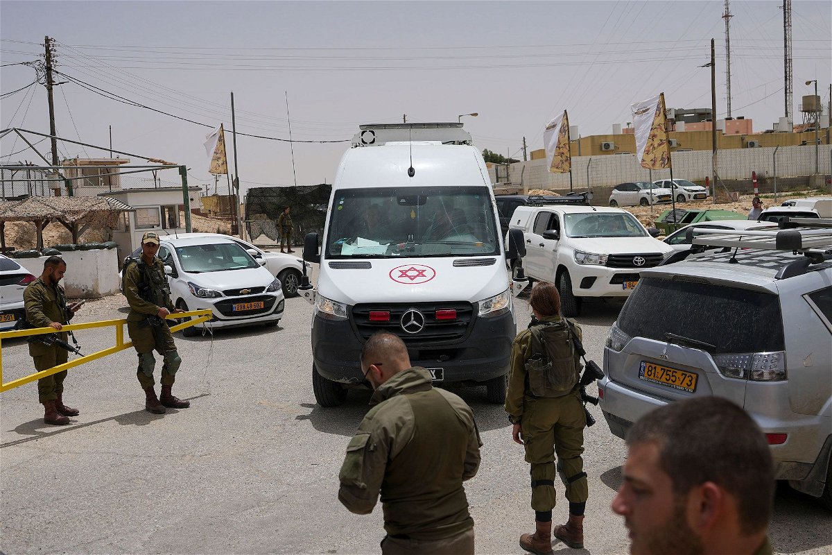 <i>Tsafrir Abayov/AP</i><br/>An ambulance leaves a military base following a deadly shootout in southern Israel along the Egyptian border on June 3.