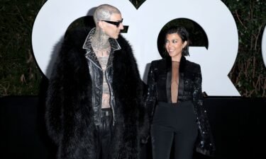 Travis Barker and Kourtney Kardashian in 2022. Kourtney Kardashian stole the show at a Blink-182 concert Friday by announcing that she and husband Travis Barker are expecting their first child together.