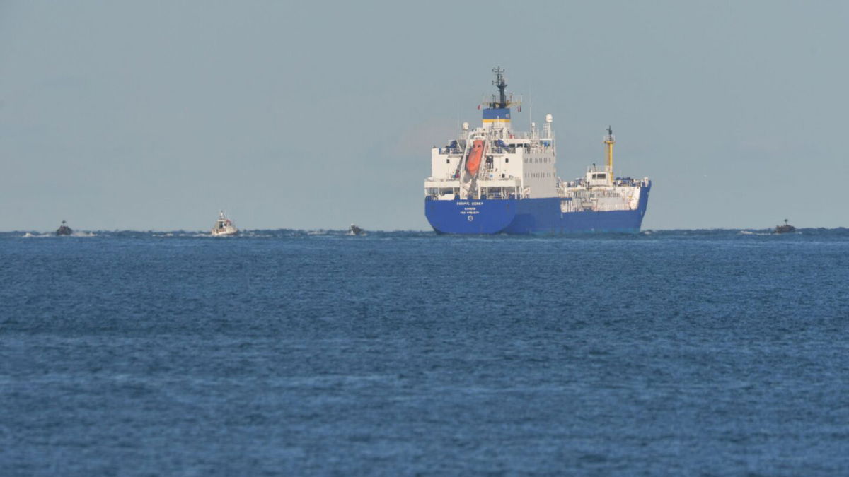 A container of radioactive Mixed Oxide Fuel (MOX) is loaded onboard a purpose-built ship in northwestern France in September 2022 ahead of its transport to Japan. The EU has lifted all import restrictions on food produced near the Fukushima nuclear plant in Japan.
