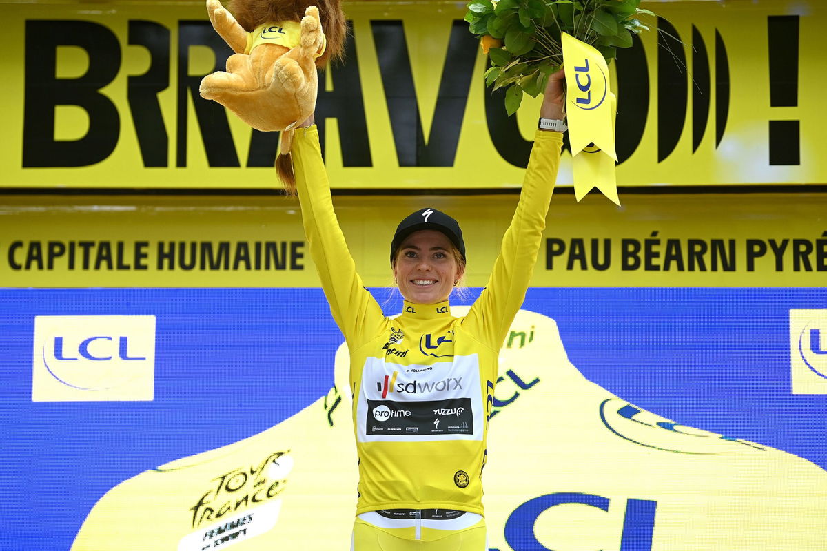 <i>Tim de Waele/Velo/Getty Images</i><br/>Demi Vollering celebrates on the podium.