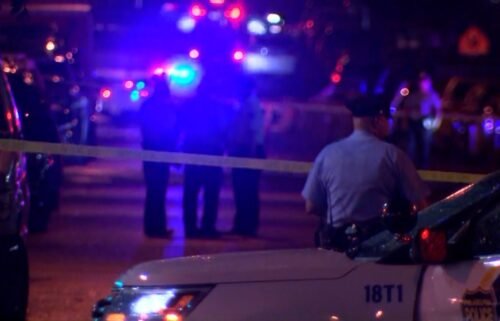 Police gathered Monday night at a shooting scene in southwestern Philadelphia.