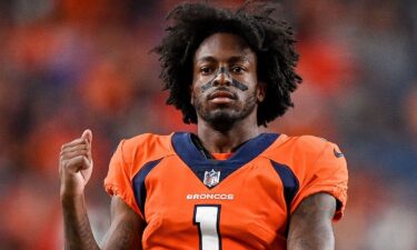 KJ Hamler looks on from the sideline during a preseason NFL game against the Minnesota Vikings at Empower Field at Mile High on August 27