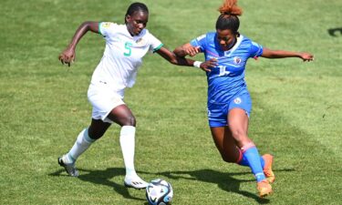 Milan Pierre-Jerome of Haiti (right) fights for the ball against Senegal in a World Cup warm-up match on February 18 in Auckland