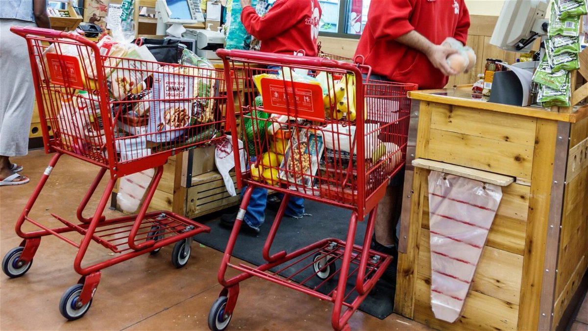 <i>Jeffrey Isaac Greenberg/Alamy Stock Photo</i><br/>Trader Joe's says it’s not adding self-checkout lines to its stores. Pictured is Trader Joe's grocery store in Miami