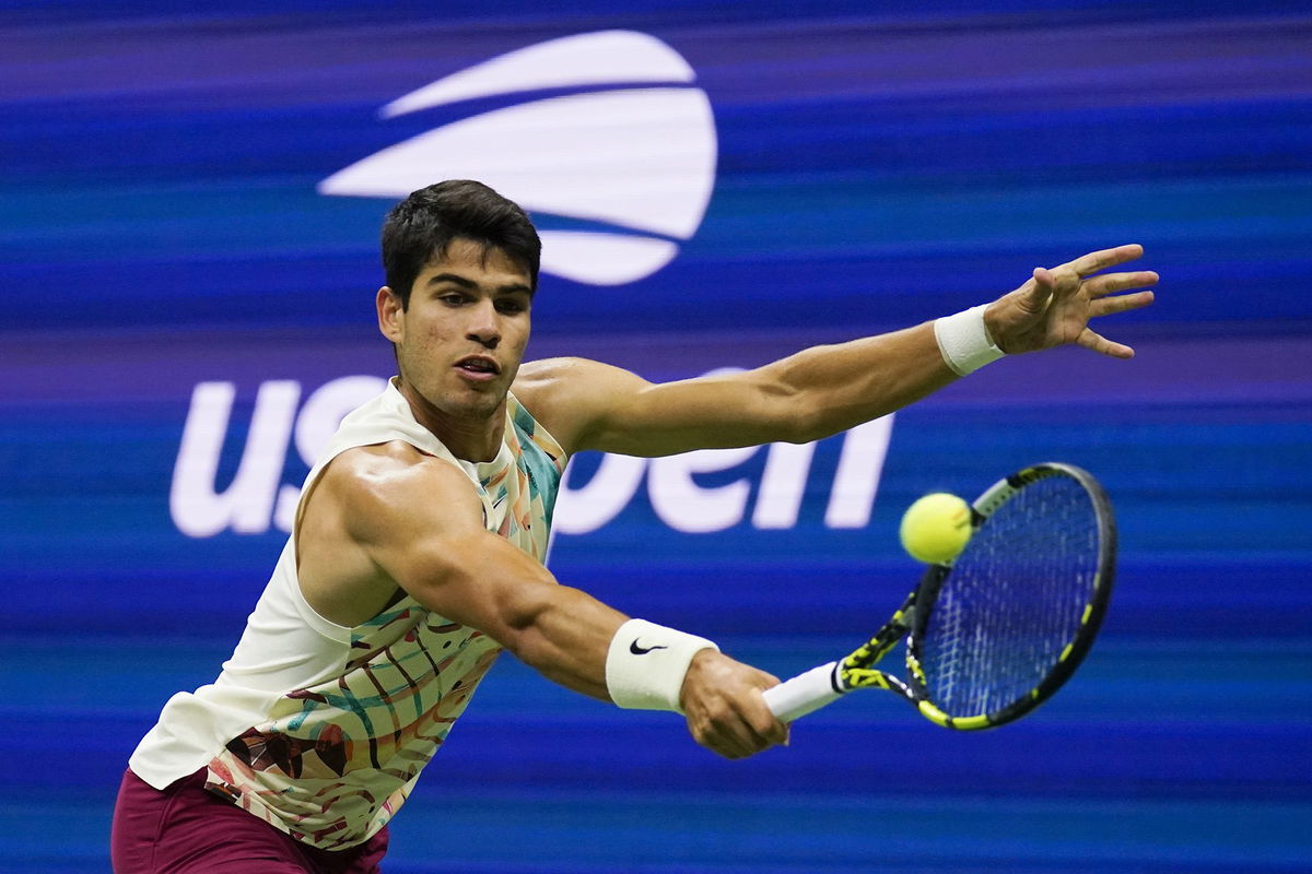 <i>Charles Krupa/AP</i><br/>The world No. 1 won under the lights on Arthur Ashe Stadium.