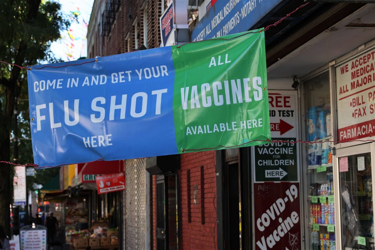 <i>Michael M. Santiago/Getty Images</i><br/>A banner for vaccines is seen at a pharmacy on September 1 in the Flatbush neighborhood of Brooklyn borough in New York City. Every year since 2010