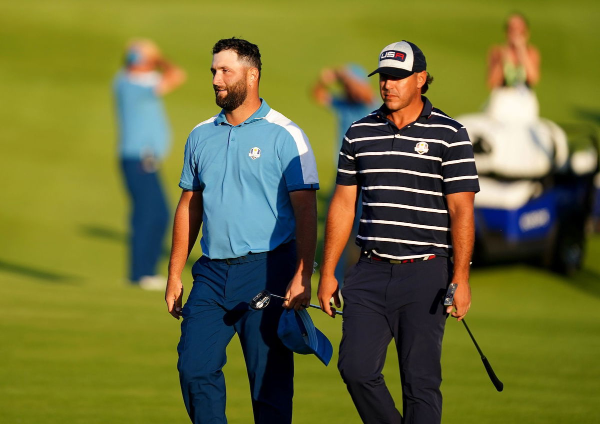 <i>Keyur Khamar/PGA Tour/Getty Images</i><br/>Team Europe celebrate Justin Rose making a crucial putt on the 18th hole.