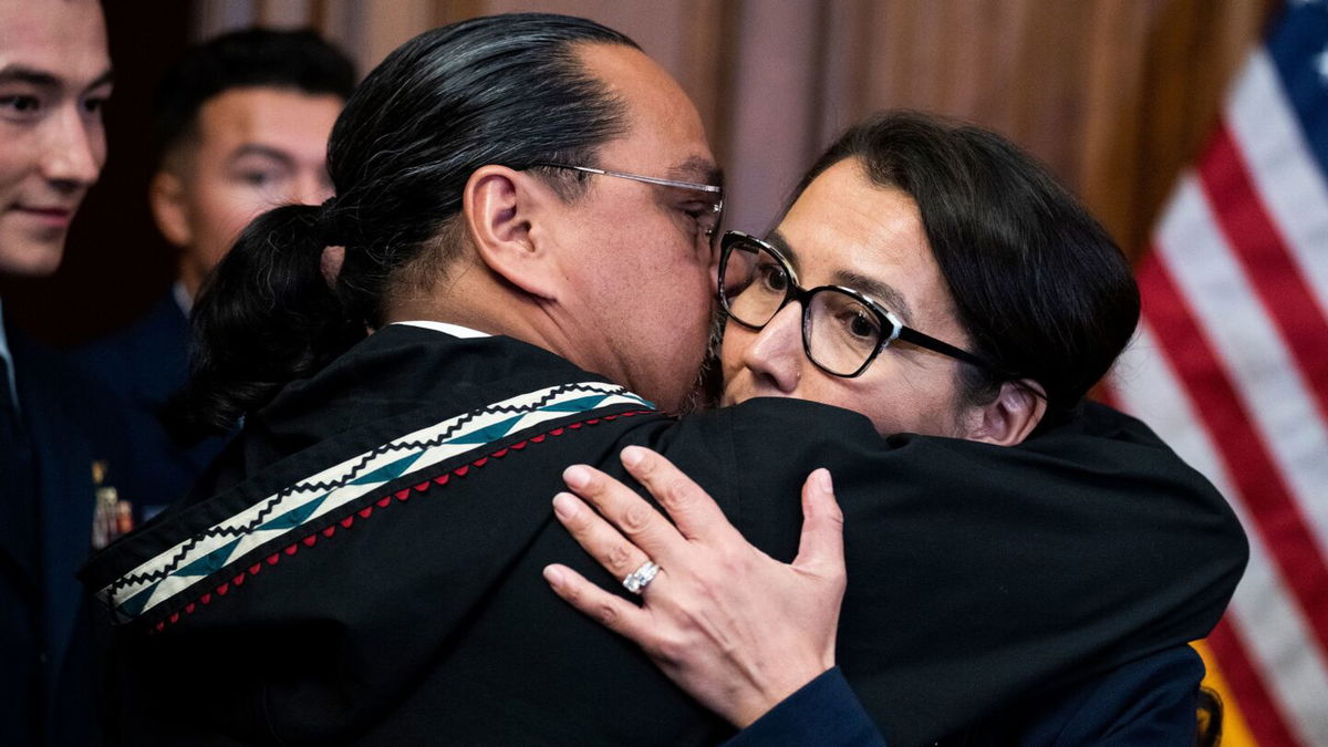 <i>Tom Williams/CQ-Roll Call/Getty Images/File</i><br/>Rep. Mary Peltola hugs her husband Eugene 