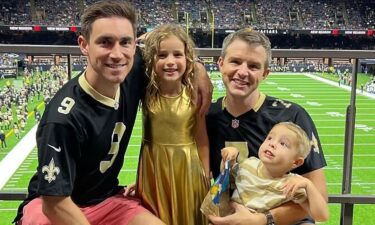 Dr. Jake Kleinmahon and his husband and two children.