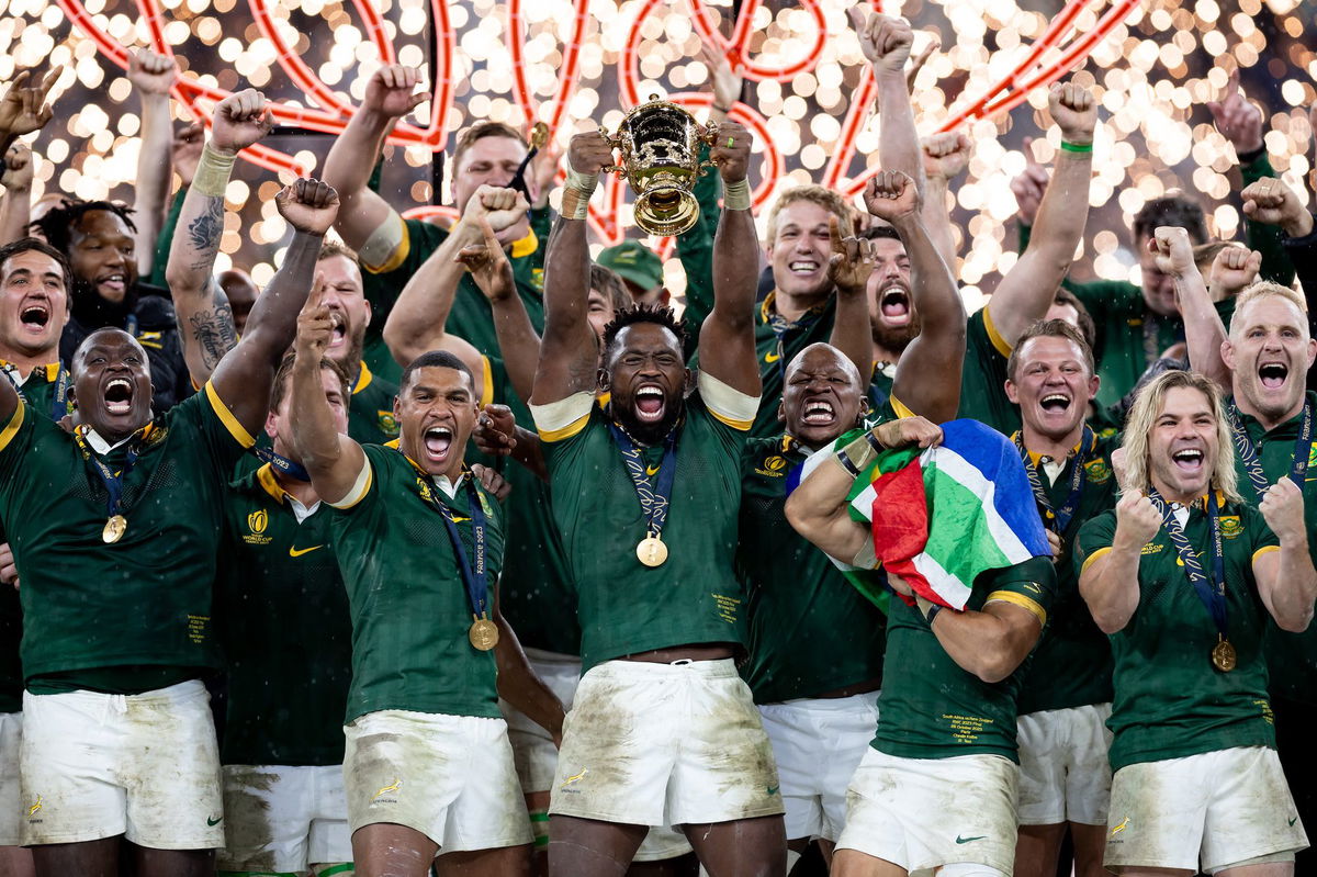 <i>Gaspafotos/MB Media/Getty Images</i><br/>Siya Kolisi lifts the William Webb Ellis trophy on Saturday.