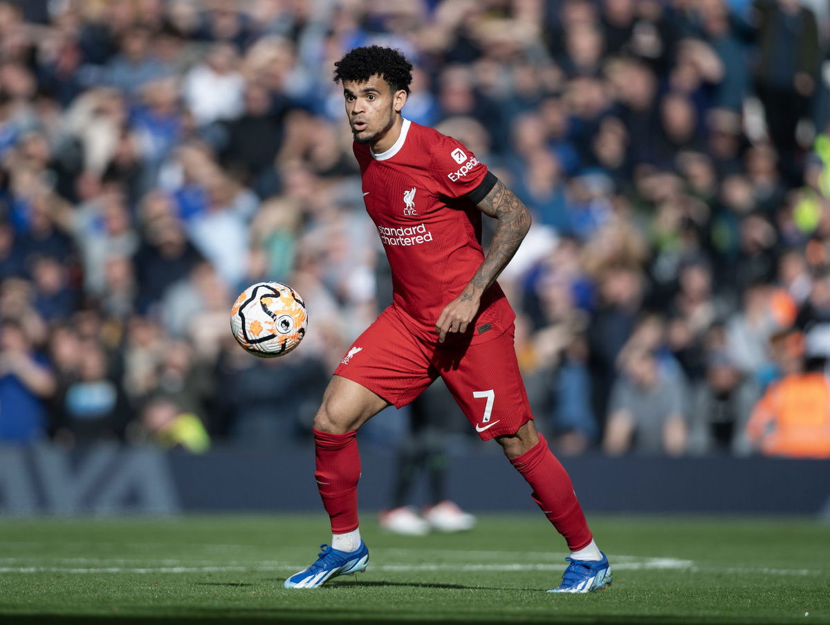 <i>Andrew Powell/Liverpool FC/Getty Images</i><br/>Diogo Jota held up Díaz's shirt after scoring on Sunday.