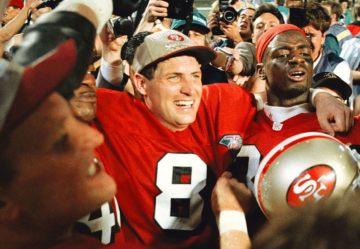 <i>MediaNews Group/Daily Review/Getty Images</i><br/>Steve Young celebrates with his team after the San Francisco 49ers won Super Bowl XXIX in 1995.