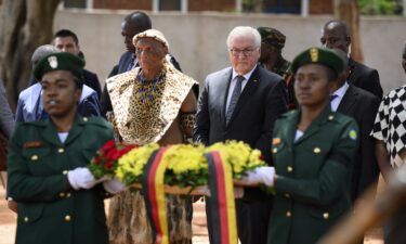 German President Frank-Walter Steinmeier lays a wreath at the monument in Songea's Memorial Park together with descendants of the heroes of the Maji Maji War on November 1.