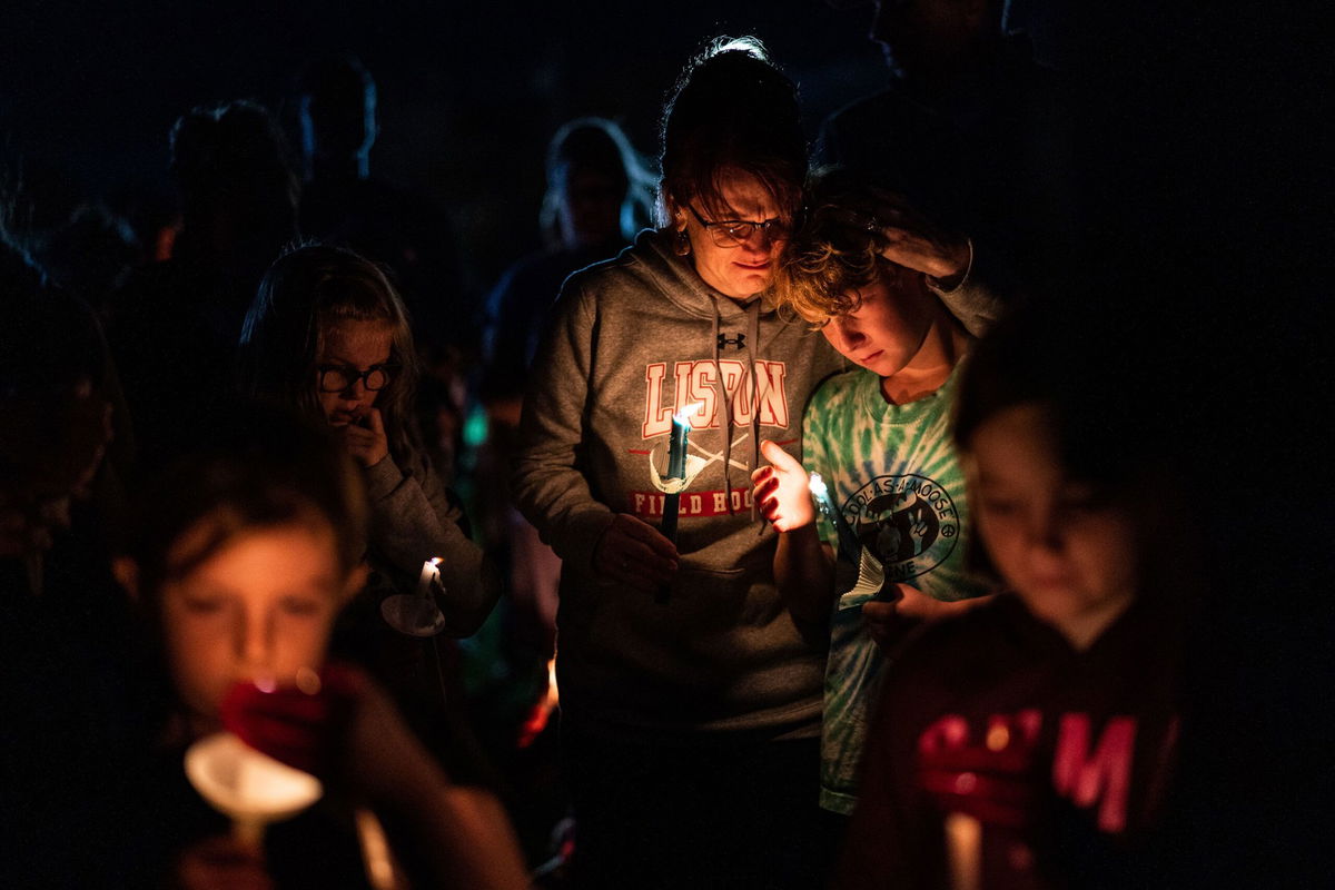 <i>Nicholas Pfosi/Reuters</i><br />Police close Lincoln Street leading to Schemengees Bar & Grille Restaurant after deadly mass shootings in Lewiston