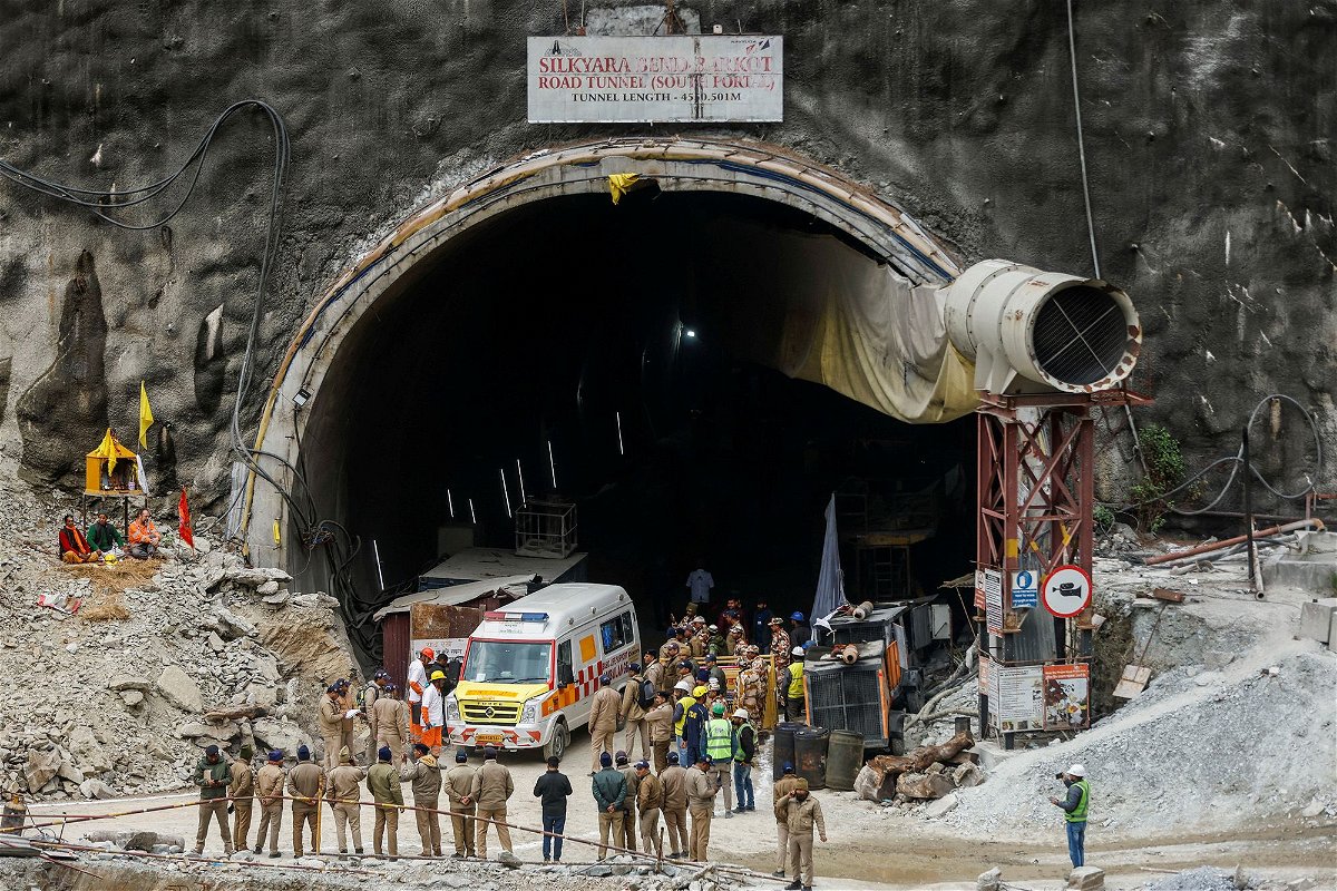 <i>Francis Mascarenhas/Reuters</i><br/>Ambulances wait in line to enter a tunnel where rescue operations are underway to rescue trapped workers in Uttarakhand