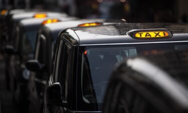 A queue of black cabs outside Victoria Station in London in November 2020. Once bitter rivals fighting for control of London’s streets