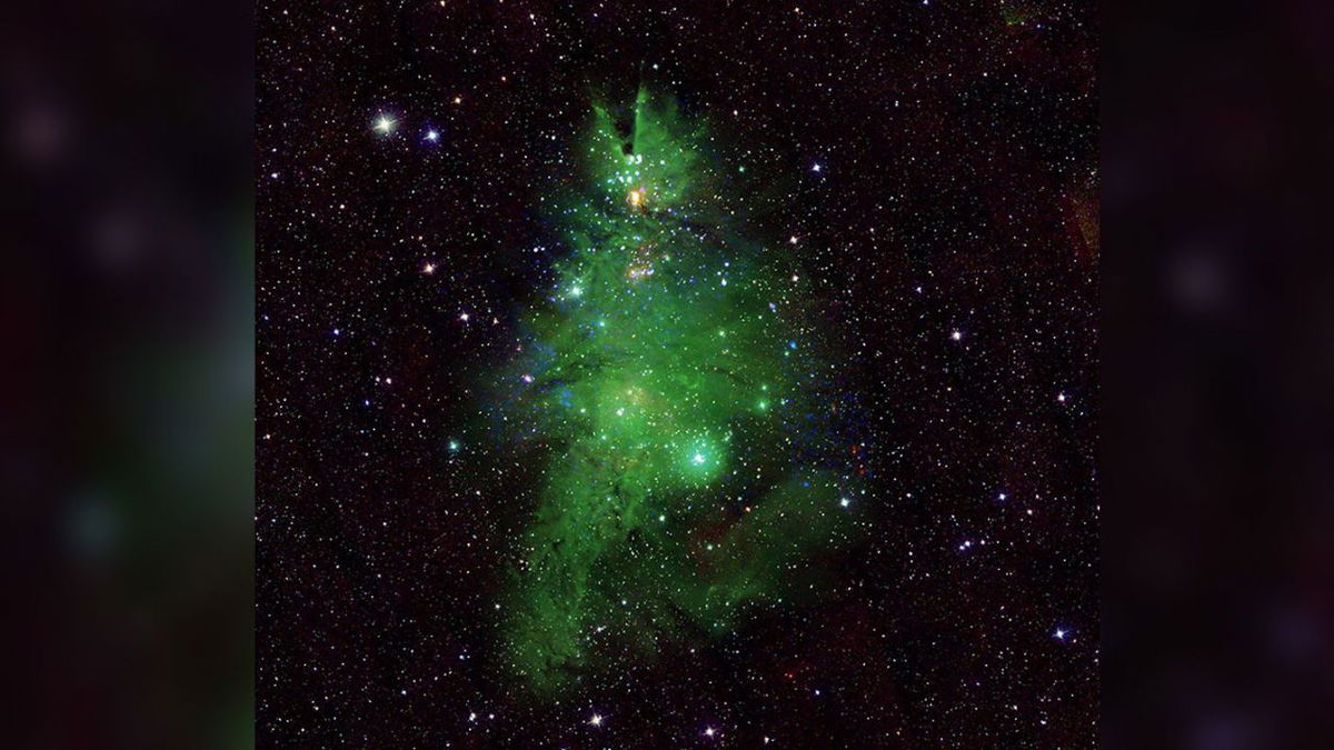 A new composite image showcases the “Christmas Tree Cluster” of young stars located about 2,500 light-years away from Earth.
