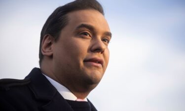 Republican Rep. George Santos of New York speaks during a news conference outside the US Capitol on November 30.