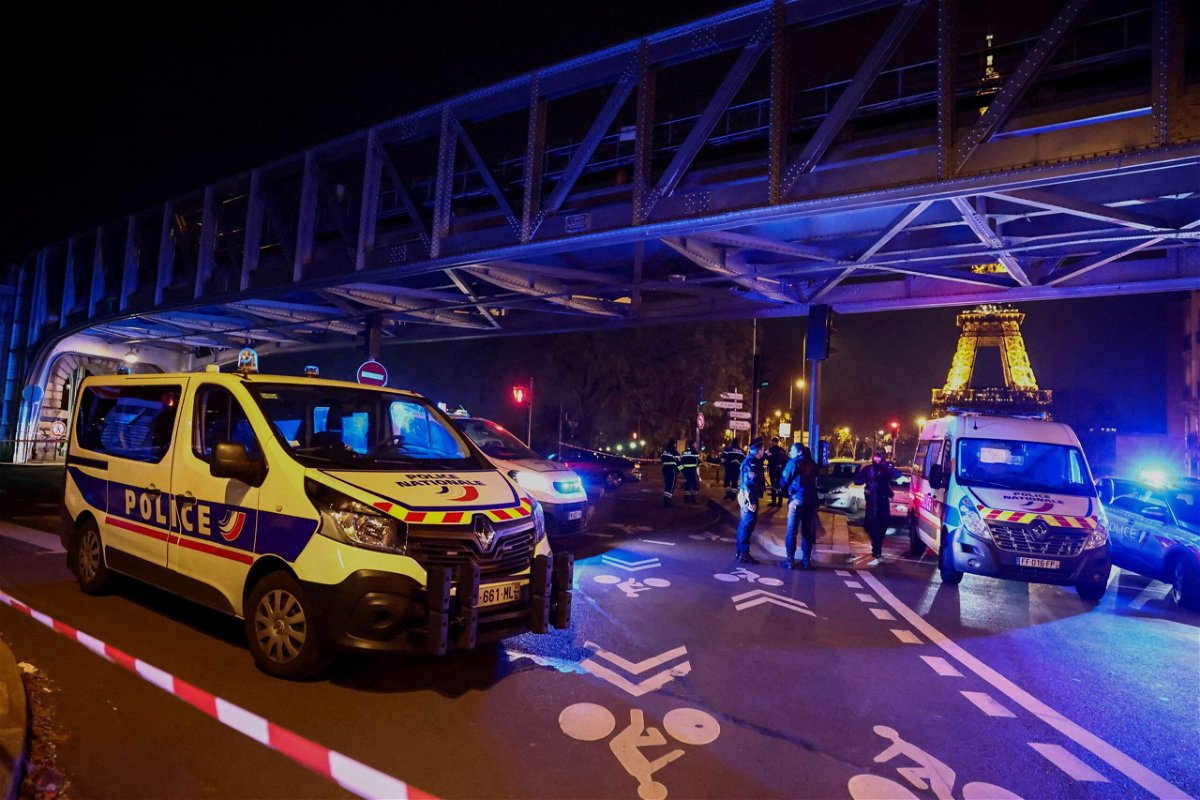 <i>Stephanie Lecocq/Reuters</i><br/>French police secure the Bir Hakeim bridge after the attack in Paris on December 2.