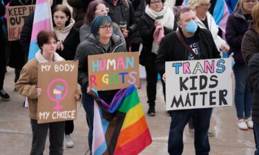 People gather in support of transgender youth during a rally at the Utah State Capitol Tuesday