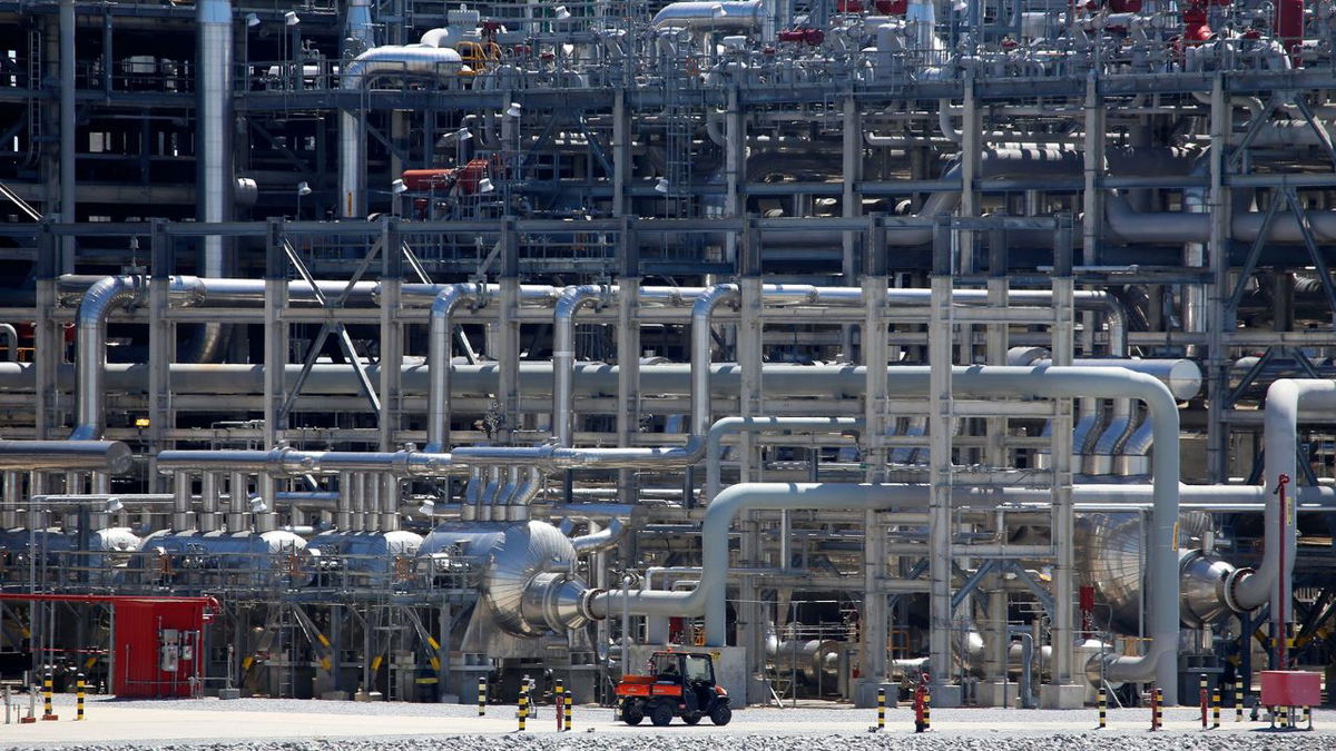 A small vehicle drives past a network of piping tat Cameron LNG export facility in Hackberry, Louisiana, on March 31, 2022.
