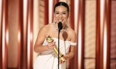 Ali Wong accepts her Golden Globe Award.