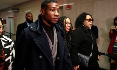 Jonathan Majors arrives with Meagan Good to court in New York in December 2023. Majors told ABC that Good has been a source of support to him in recent months