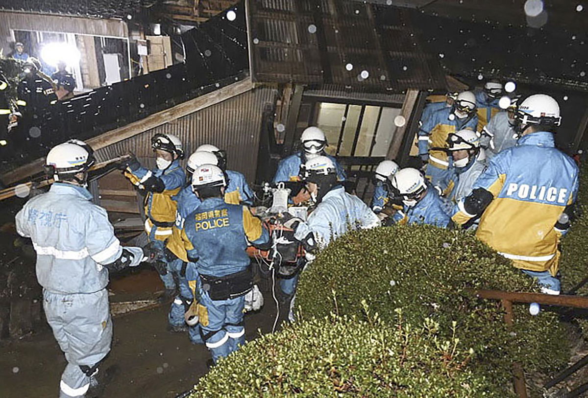 <i>Metropolitan Police Department/Kyodo News/AP</i><br/>The rescue operation takes place in Suez City of Ishikawa prefecture