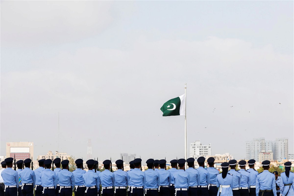 <i>Akhtar Soomro/Reuters</i><br/>Members of the Pakistan Air Force (PAF) stand in formation during the national anthem
