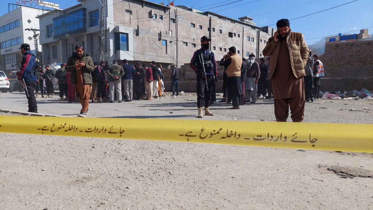 <i>Fayyaz Ahmed/EPA-EFE/Shutterstock</i><br/>Pakistani security officials inspect the scene of a blast in Quetta