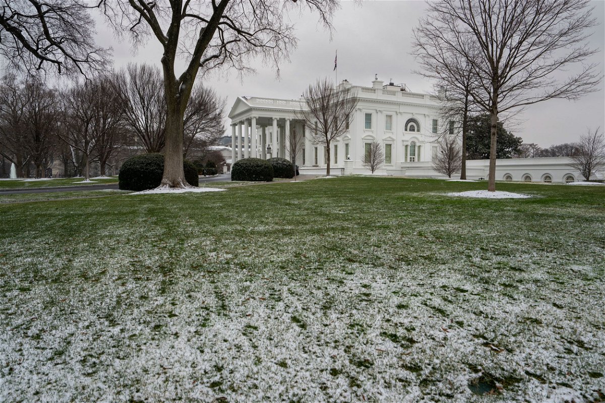<i>Ken Cedeno/Sipa/AP</i><br />The White House is seen under a dusting of snow January 15 in Washington DC. President Joe Biden signed into law a short-term funding extension on January 19