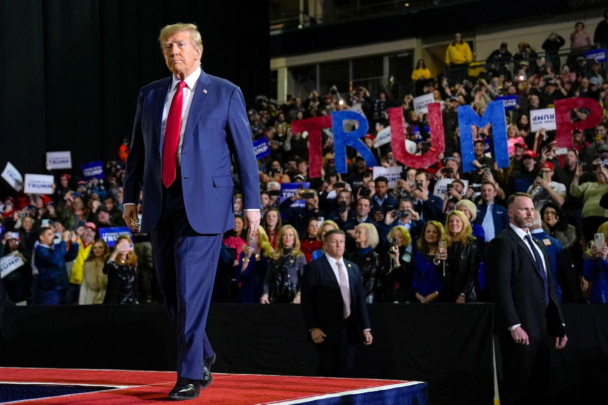 <i>Matt Rourke/AP</i><br/>Republican presidential candidate former President Donald Trump walking toward the podium before his remark at a campaign event in Manchester