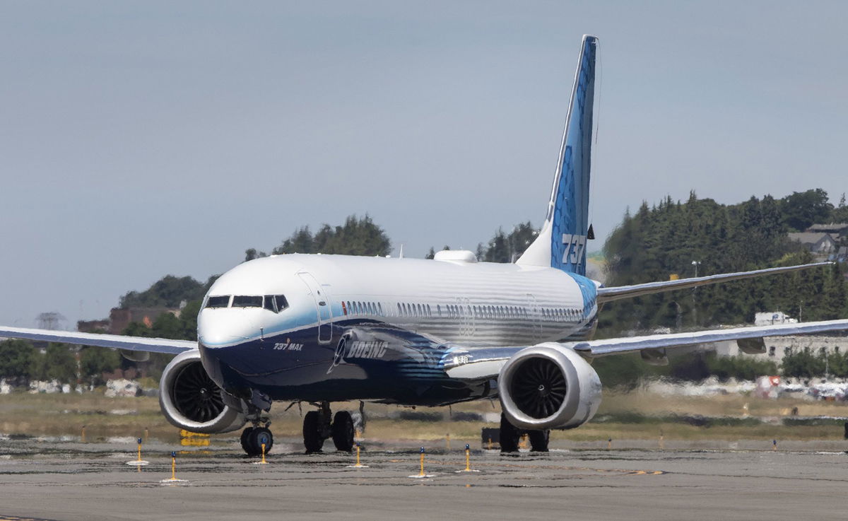 <i>Ellen Banner/Pool/Getty Images</i><br/>A Boeing 737 MAX 10 airliner taxis at Boeing Field after its first flight on June 18