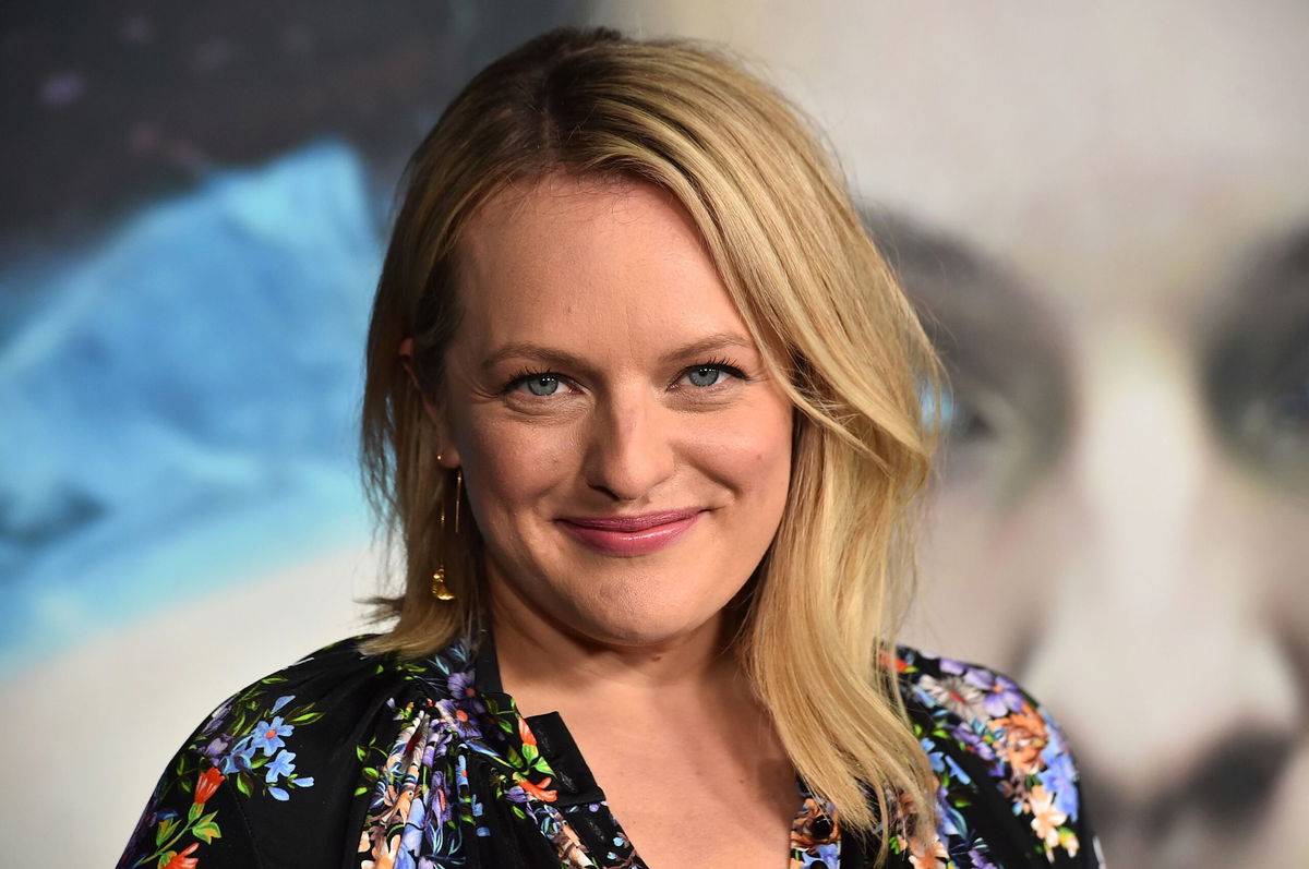 <i>Jordan Strauss/Invision/AP</i><br/>Elisabeth Moss gets parenting tips from Jimmy Kimmel