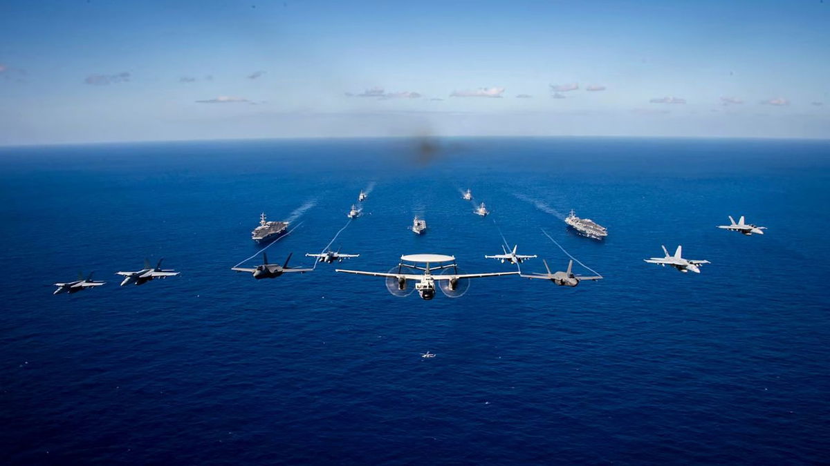 US Navy aircraft fly in formation during an exercise held in the Philippine Sea on January 31.
