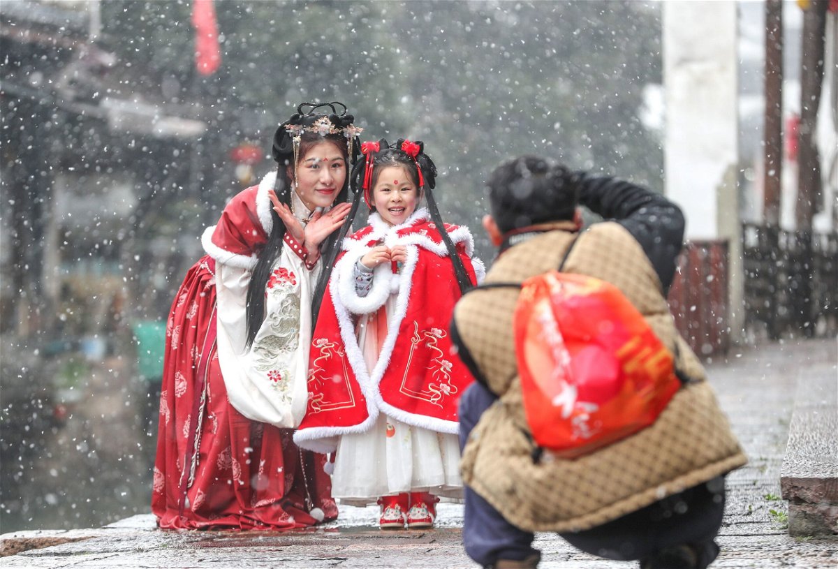 For some Spring Festival revelers in China, traditional attire adds an  element of time travel to celebrations