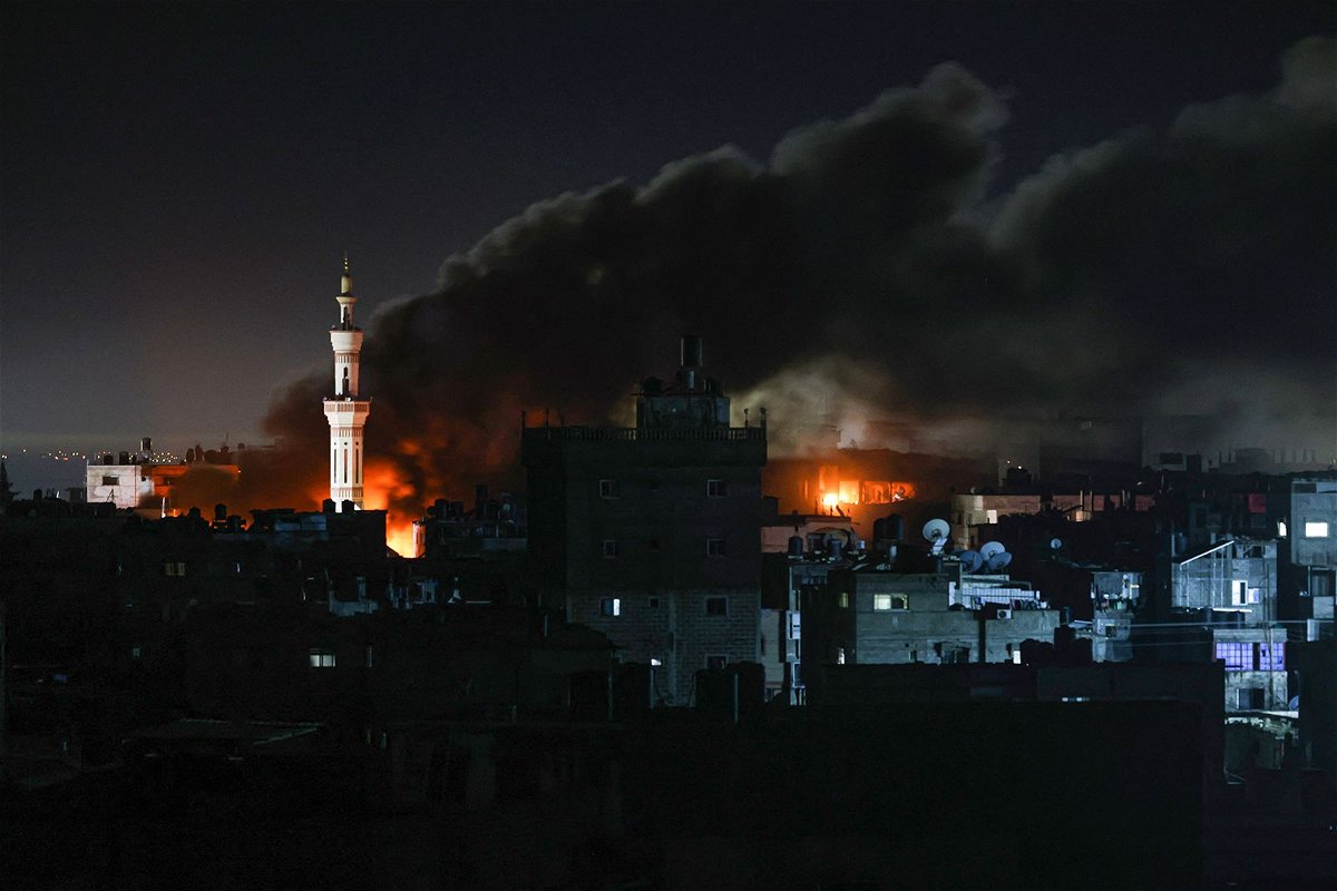 <i>Said Khatib/AFP/Getty Images</i><br/>Smoke billows during Israeli bombardment over Rafah in the southern Gaza Strip on February 12.