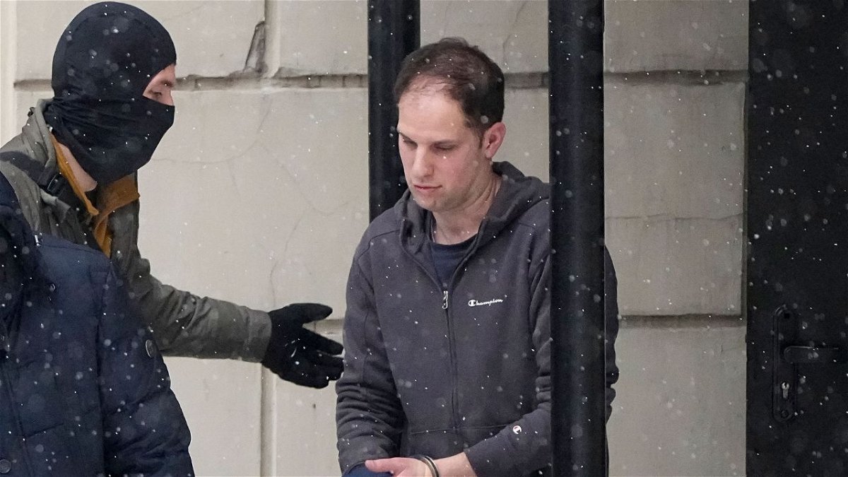 Wall Street Journal reporter Evan Gershkovich is escorted from court after a hearing in Moscow in January 2024.
