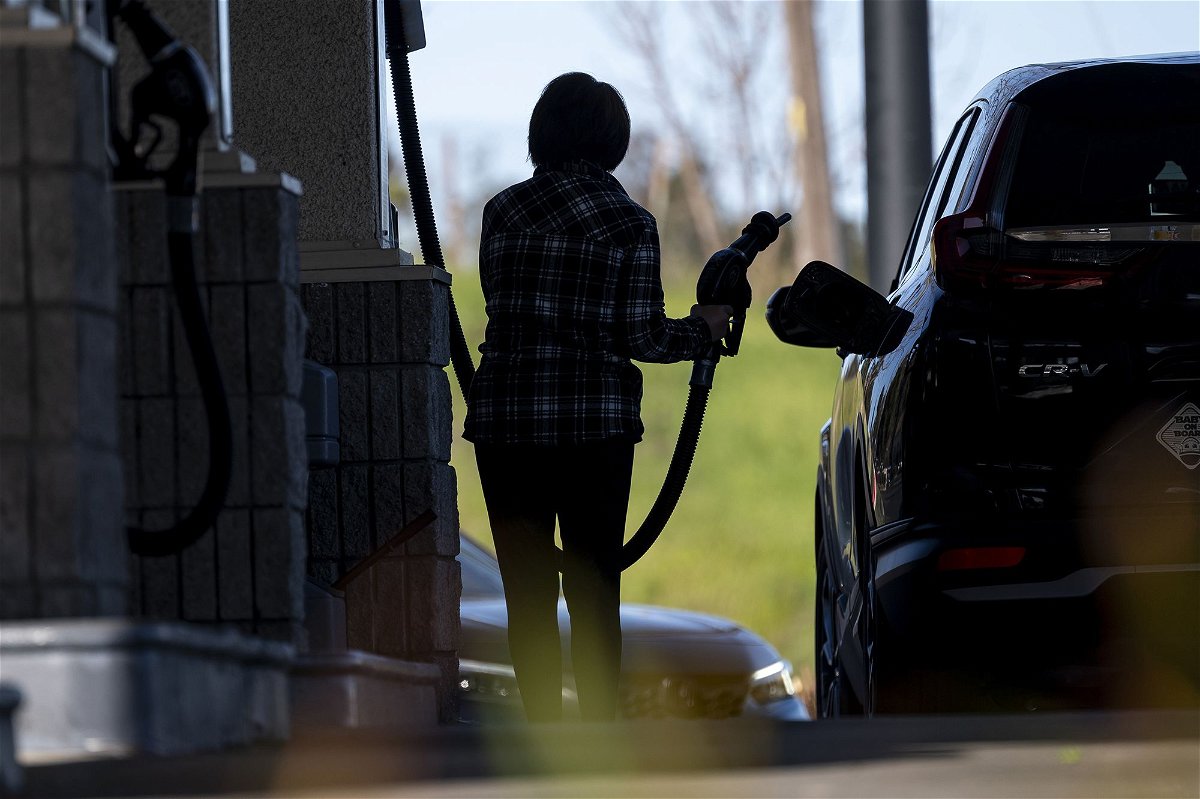 <i>David Paul Morris/Bloomberg/Getty Images via CNN Newsource</i><br/>A customer pumps gas at a gas station in Hercules